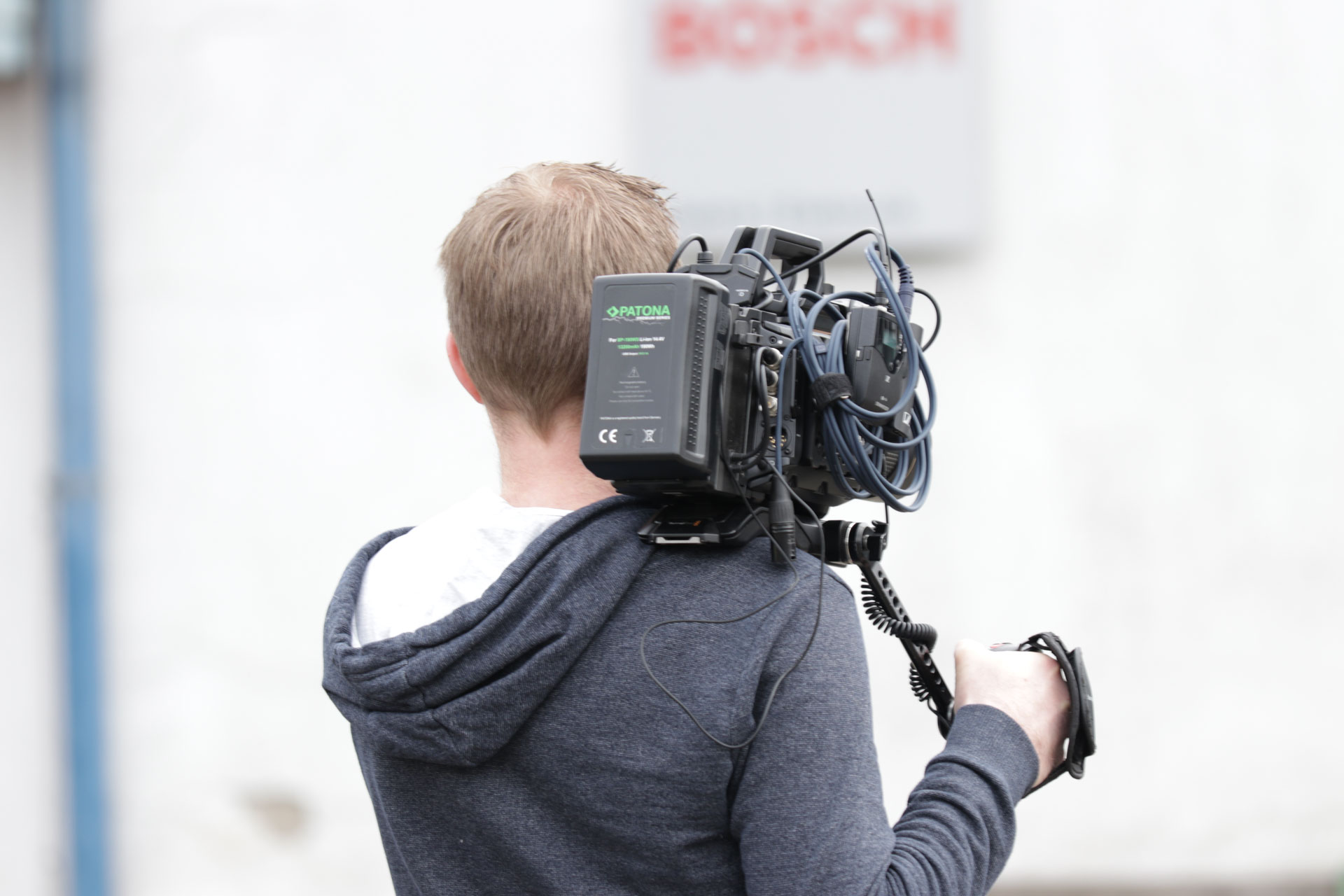 Bild von Person mit Kamera